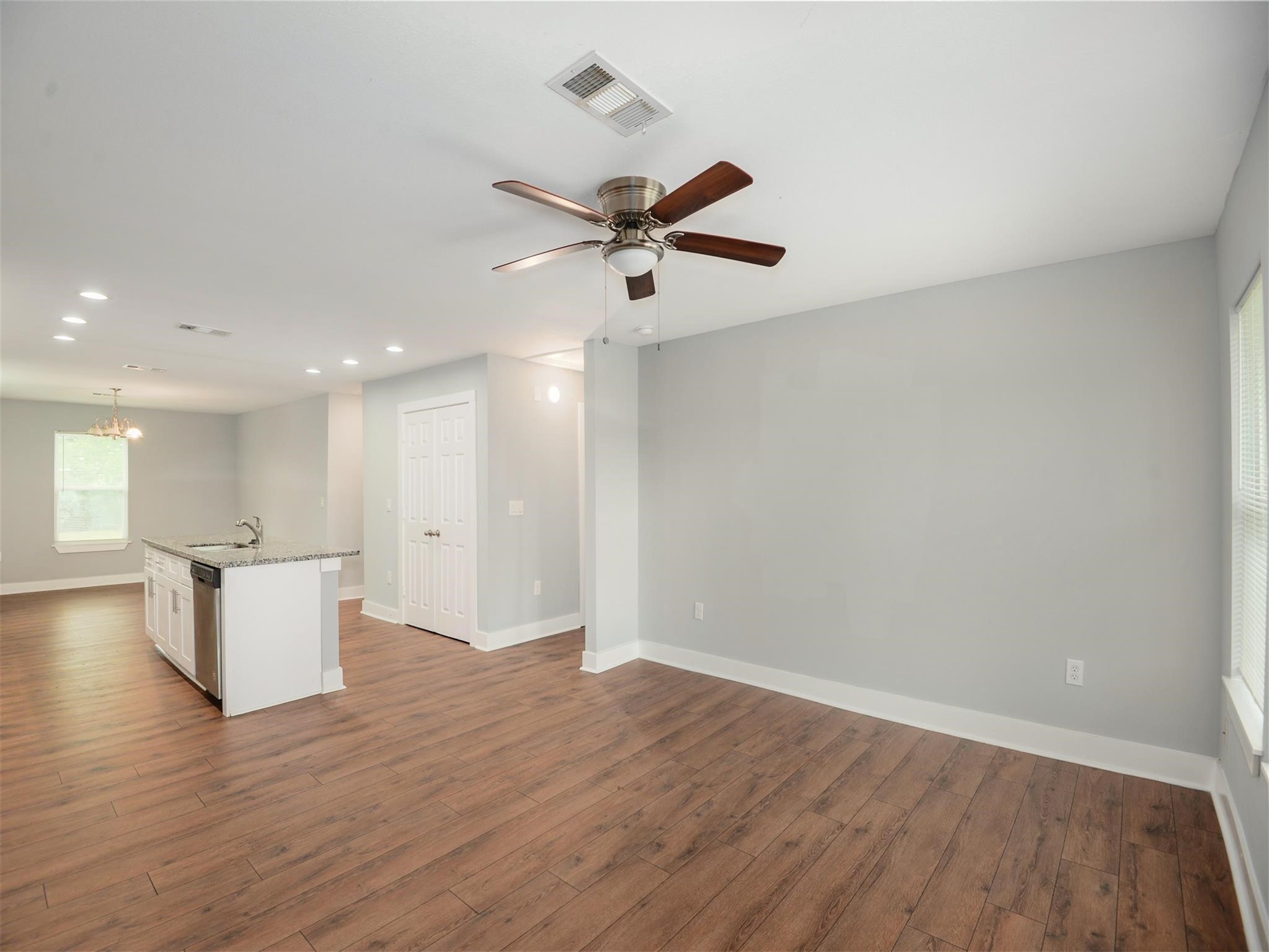 7815 Jester Street Houston, TX 77051 - Photo 7 of 22 a view of a kitchen with a sink and a window