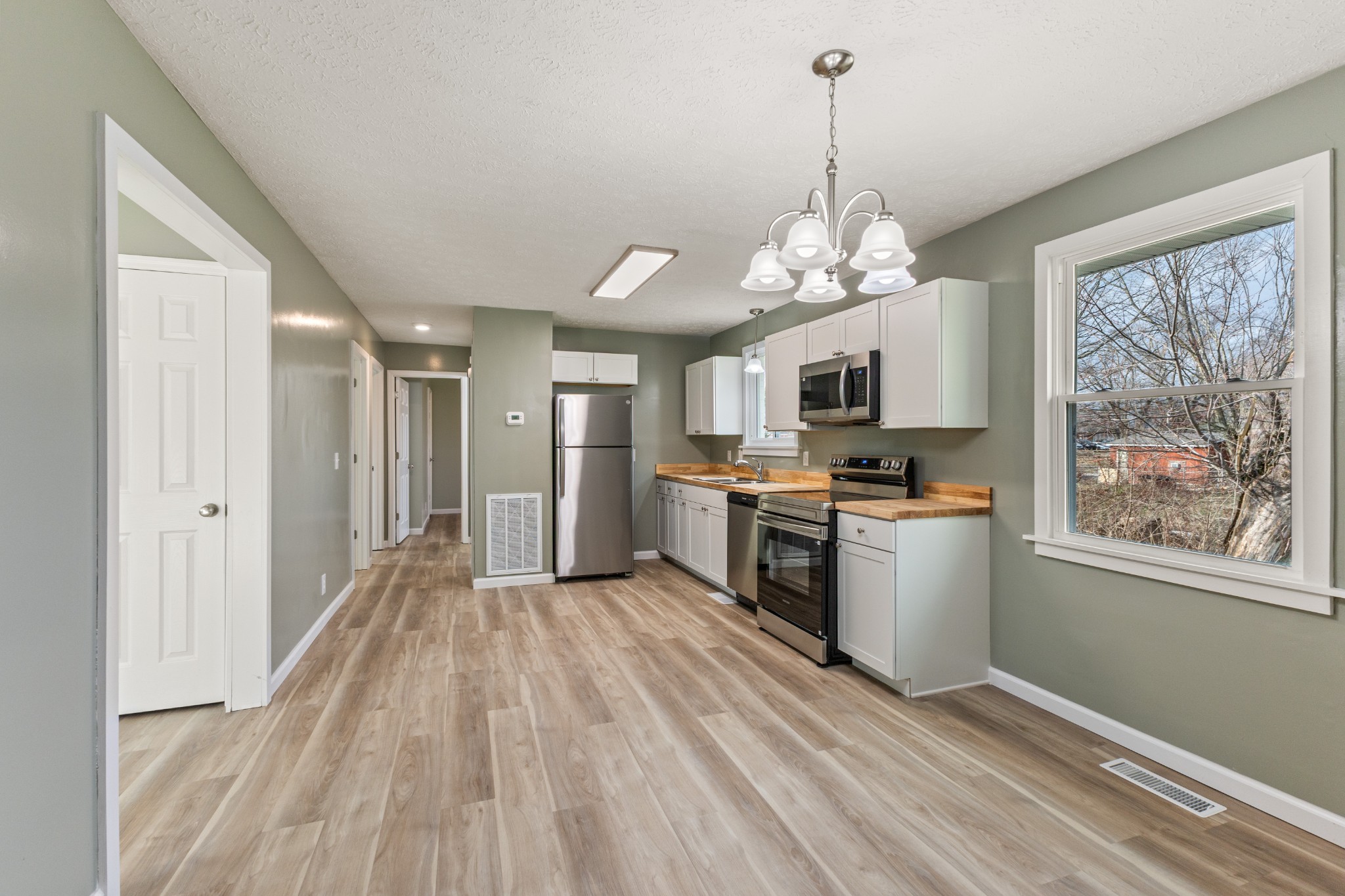7109 King Road Fairview, TN 37062 - Photo 15 of 26 a view of a kitchen with microwave and stove