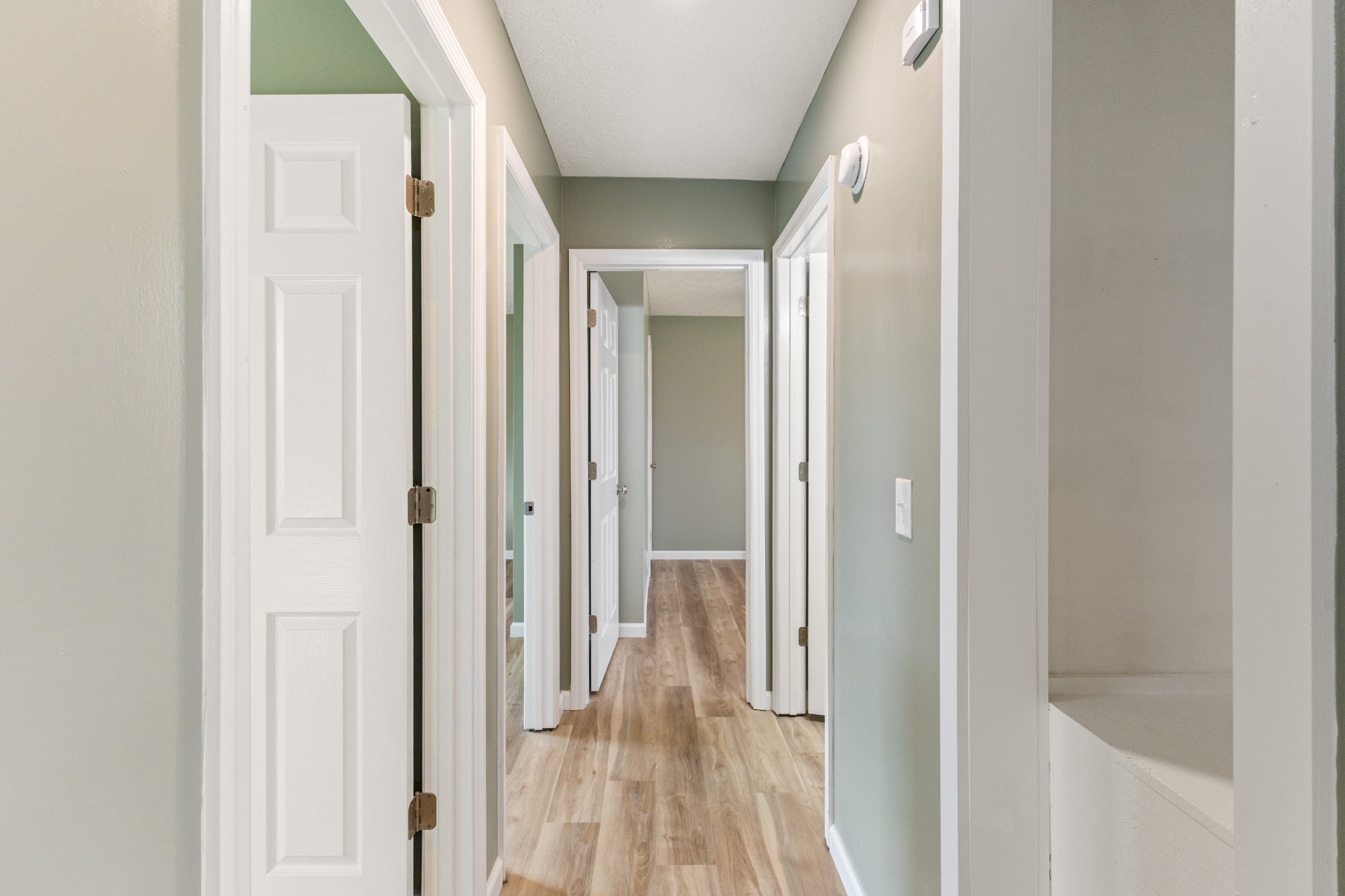 7109 King Road Fairview, TN 37062 - Photo 17 of 26 a view of a hallway with wooden floor