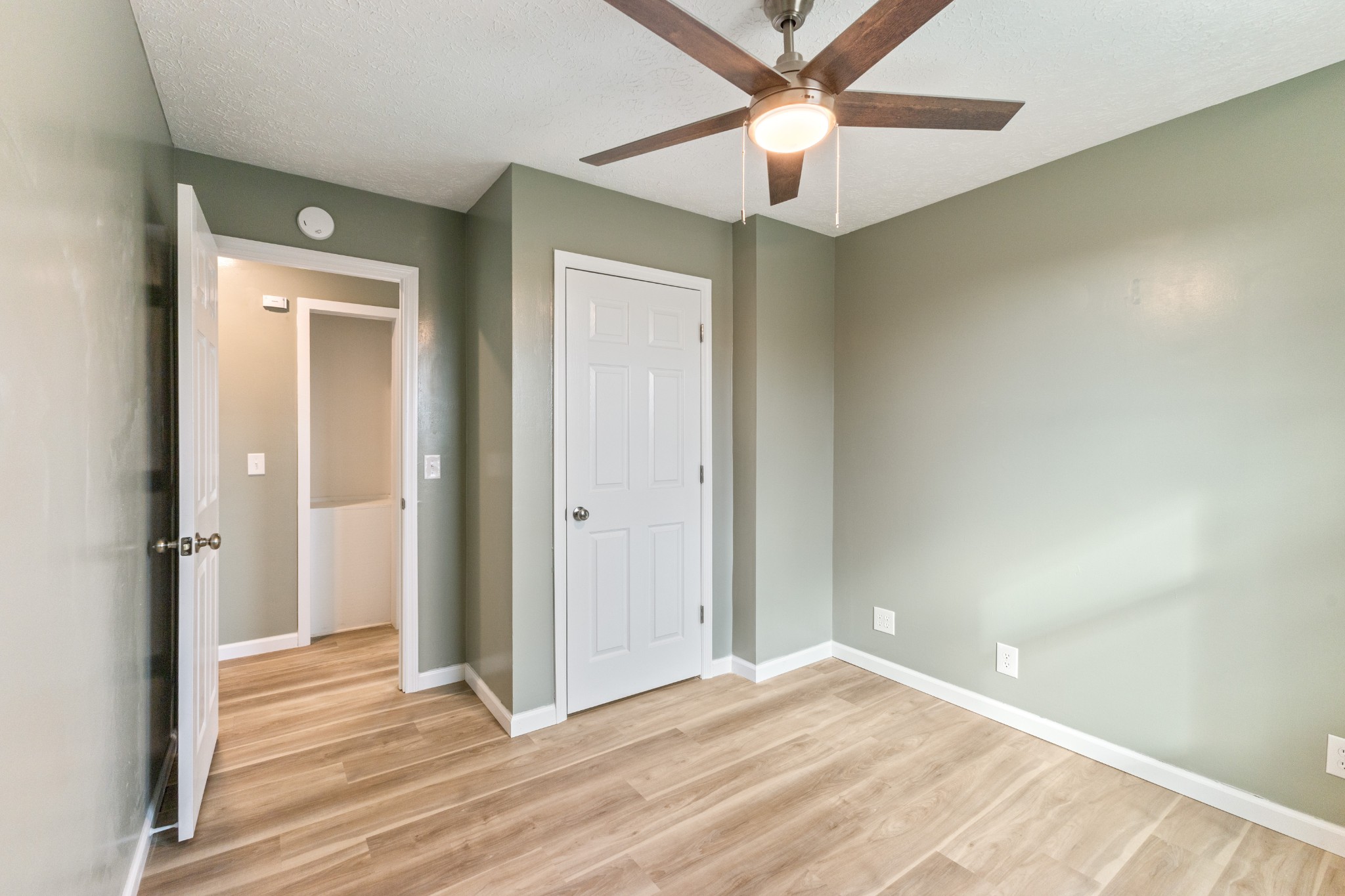 7109 King Road Fairview, TN 37062 - Photo 22 of 26 a view of an empty room with wooden floor