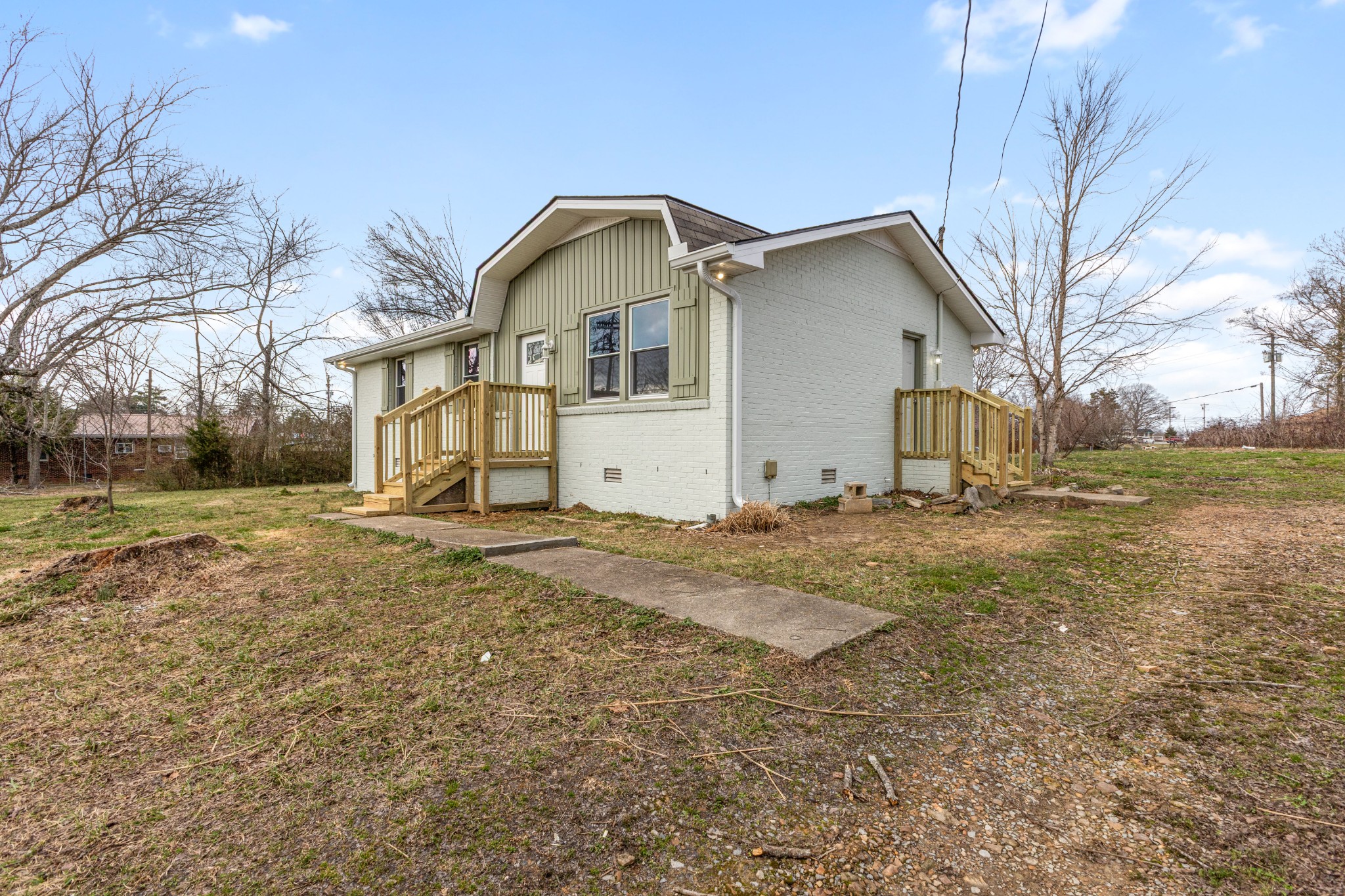 7109 King Road Fairview, TN 37062 - Photo 3 of 26 a front view of a house with a yard