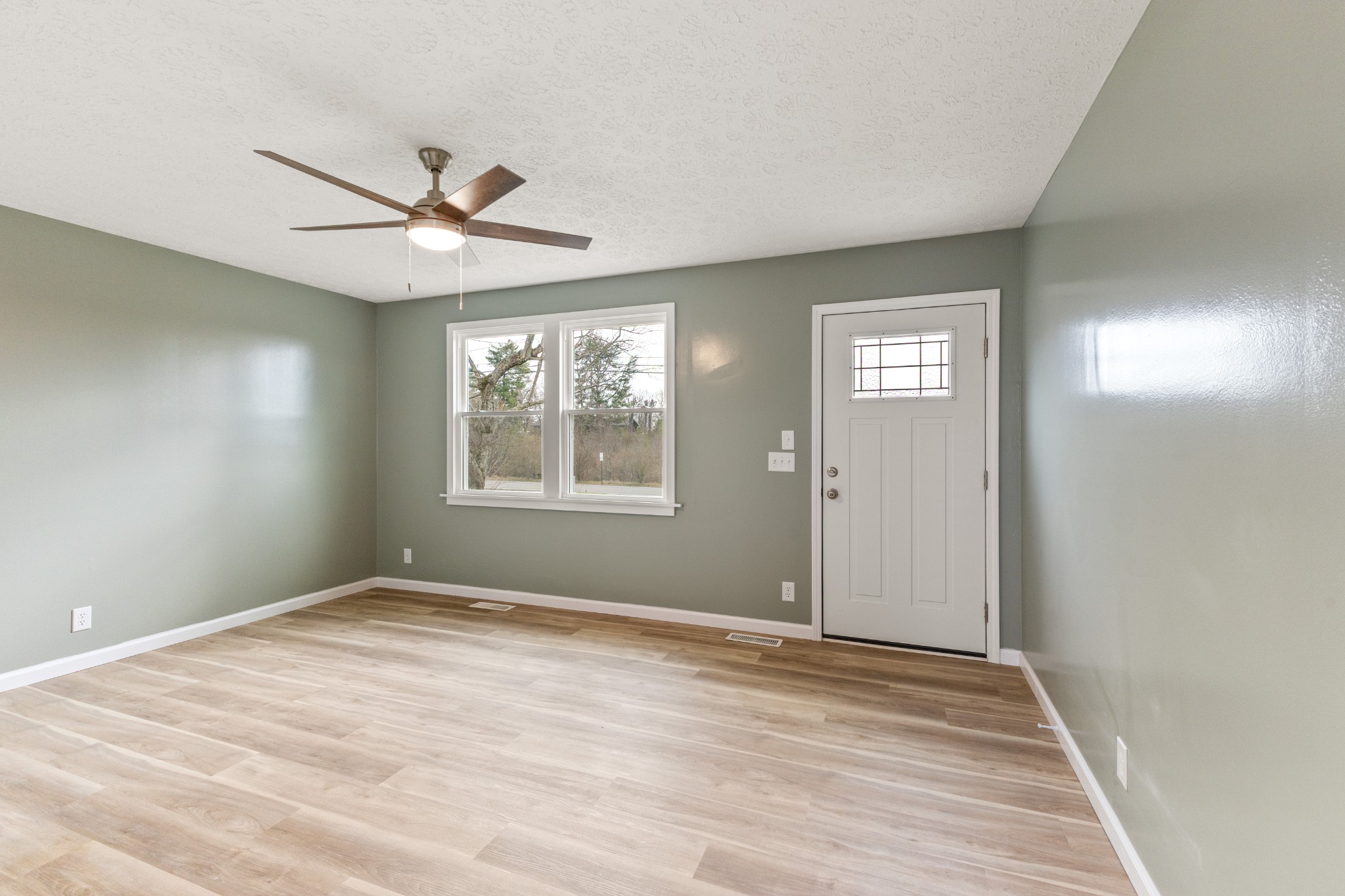 7109 King Road Fairview, TN 37062 - Photo 10 of 26 wooden floor in an empty room with a window