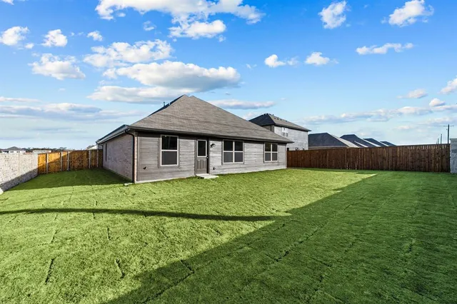 a view of a house with a big yard