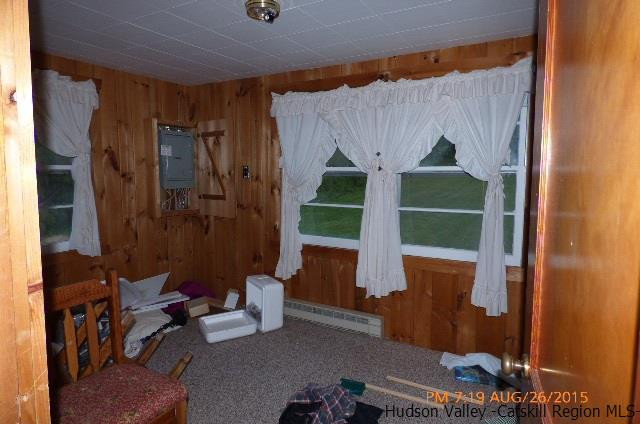 497 County Route 56 Maplecrest, NY 12454 - Photo 6 of 9 a room with musical instruments