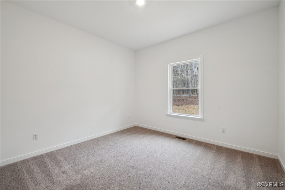 2343 Old Church Road Powhatan, VA 23139 - Photo 26 of 38 Bedroom 2 with carpet and double door closet.