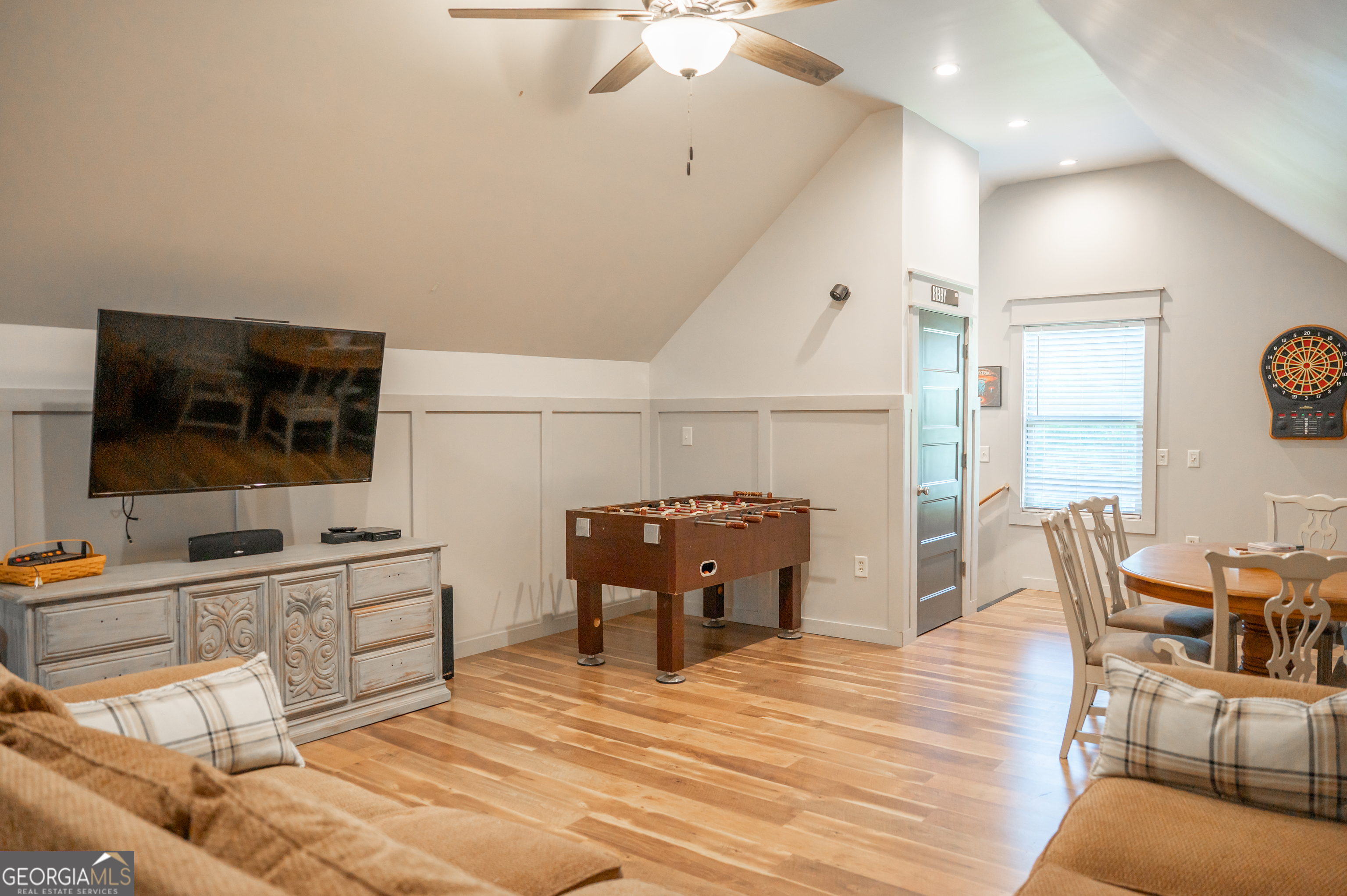 415 EAS Way Fayetteville, GA 30215 - Photo 62 of 70 a living room with furniture and a flat screen tv