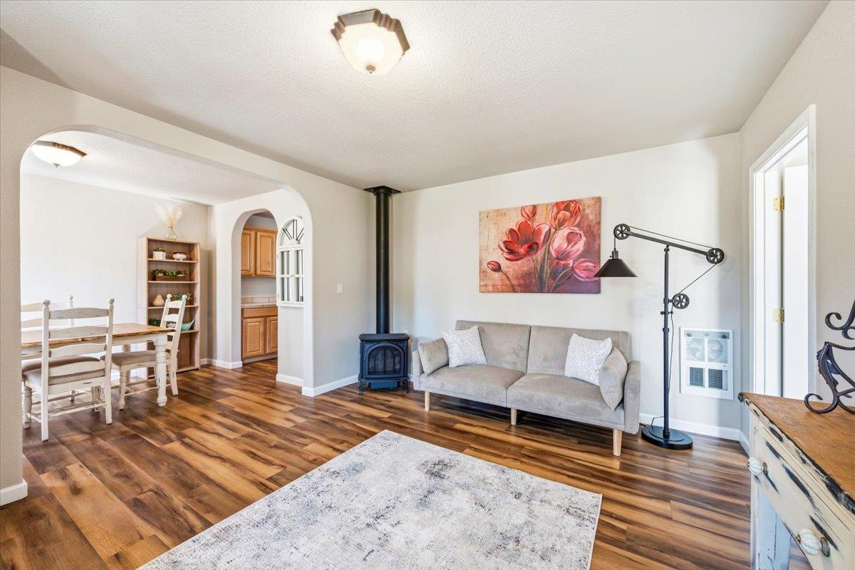 232 Upper Slate Creek Road Grass Valley, CA 95945 - Photo 5 of 48 a living room with furniture and a rug