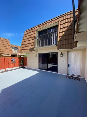 a front view of a house with a garage