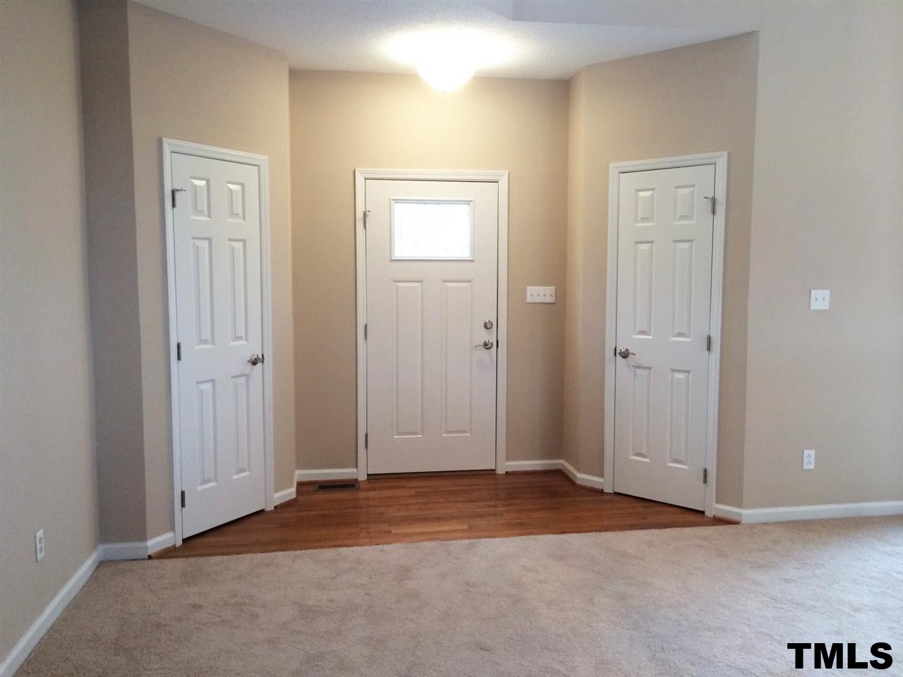 1607 Edenderry Court Garner, NC 27529 - Photo 2 of 22 an empty room with windows