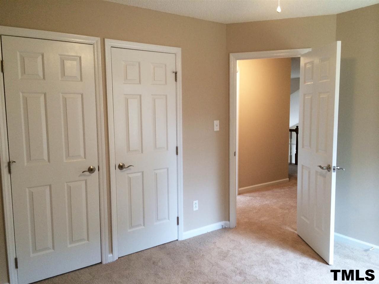1607 Edenderry Court Garner, NC 27529 - Photo 16 of 22 an empty room with windows