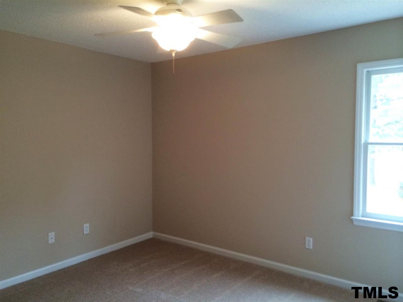 1607 Edenderry Court Garner, NC 27529 - Photo 21 of 22 an empty room with a window