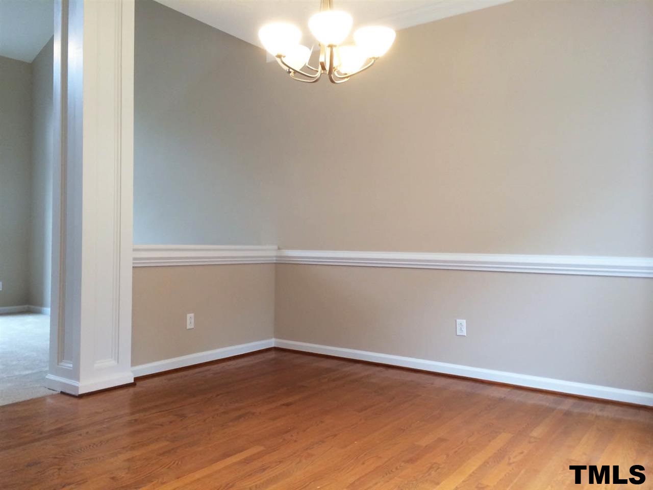 1607 Edenderry Court Garner, NC 27529 - Photo 4 of 22 an empty room with wooden floor