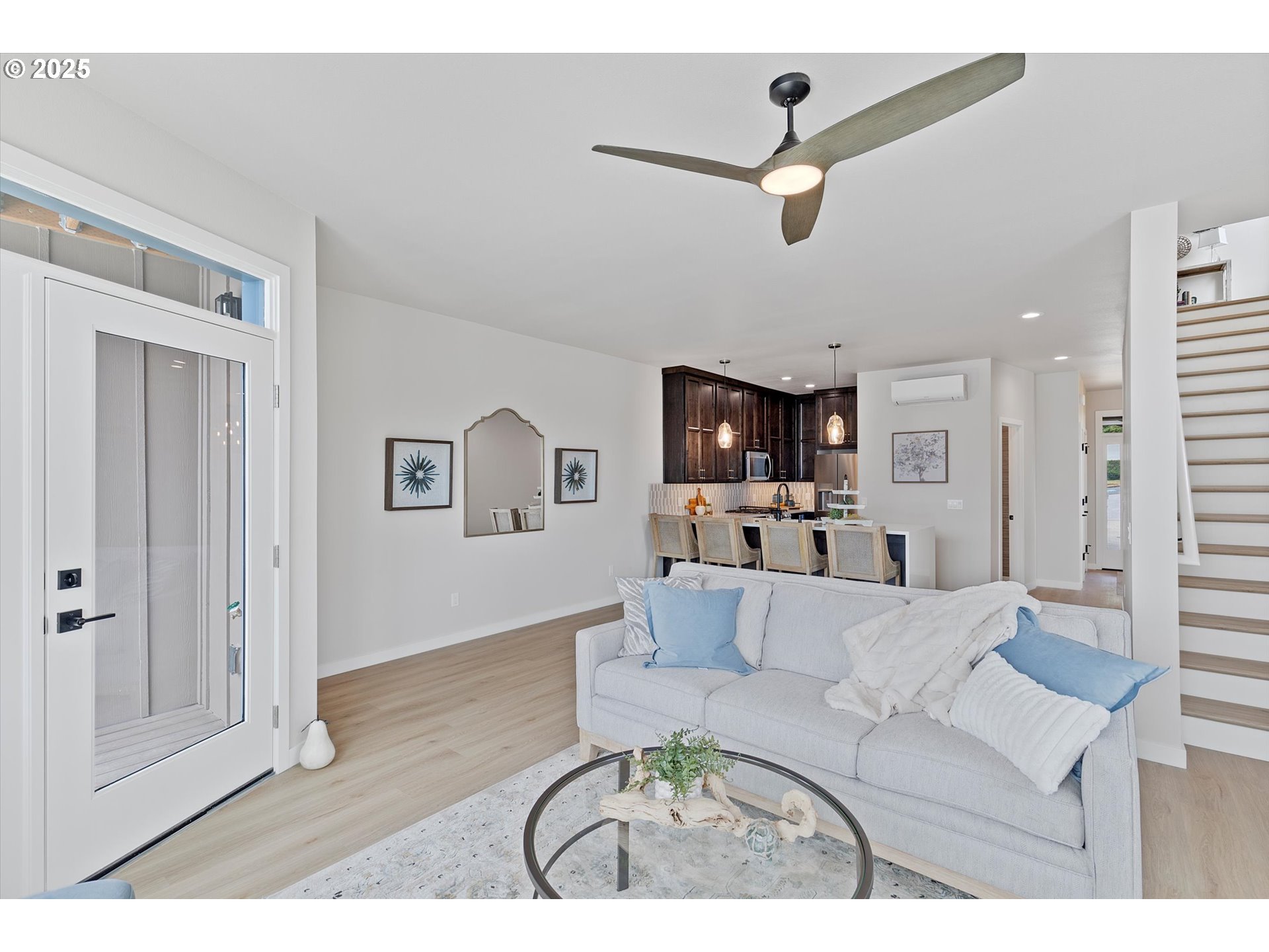 811 Southwest 13th Street Newport, OR 97365 - Photo 13 of 45 a living room with furniture and a flat screen tv