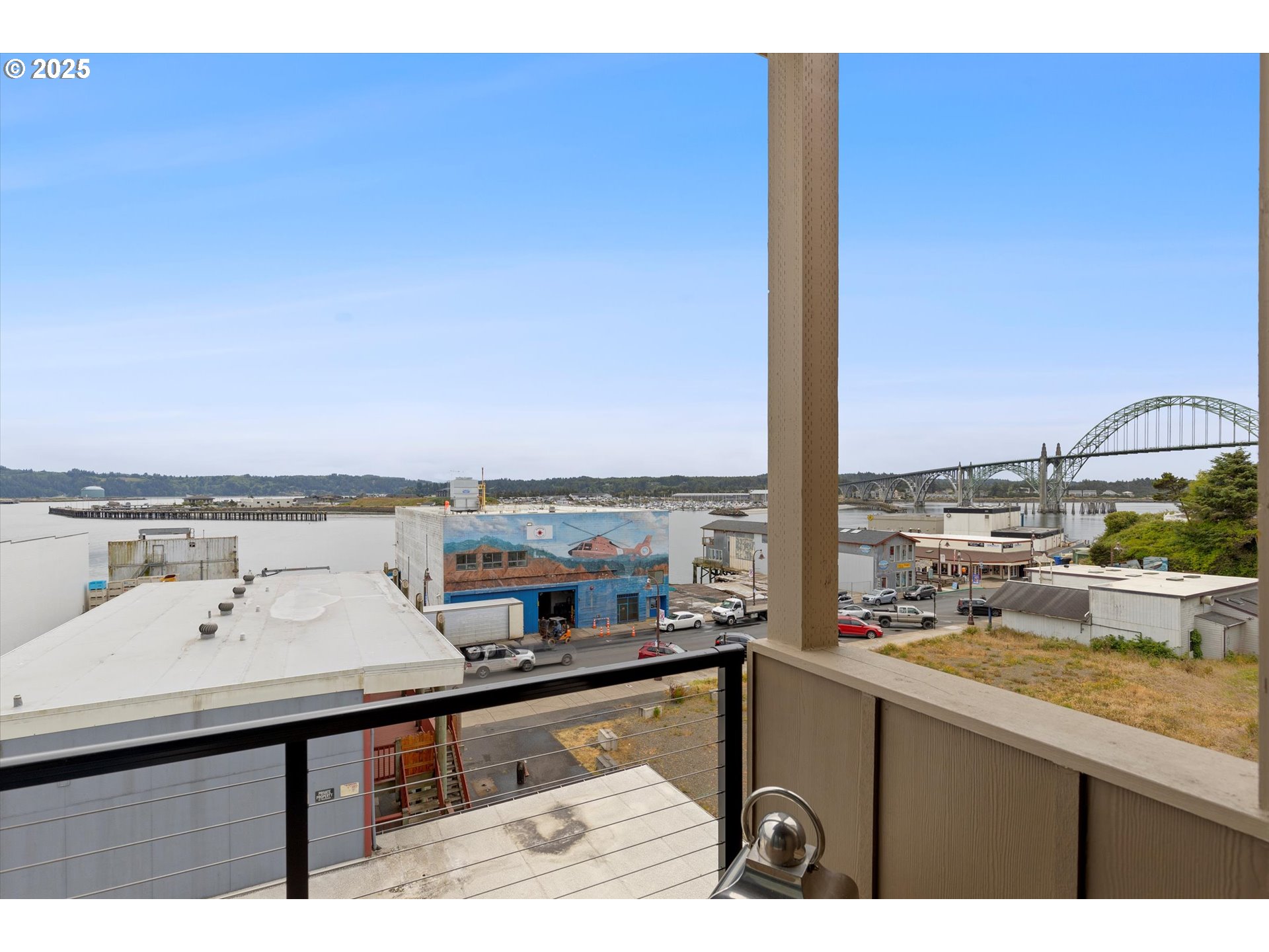 811 Southwest 13th Street Newport, OR 97365 - Photo 15 of 45 a bathroom with a sink and a large mirror