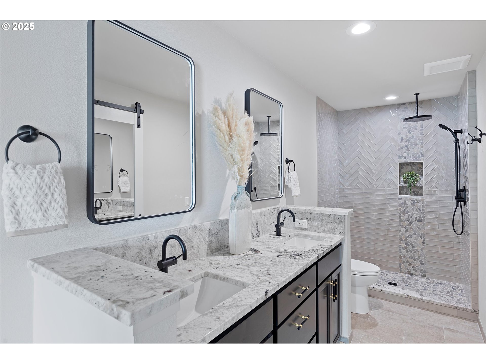 811 Southwest 13th Street Newport, OR 97365 - Photo 29 of 45 a bathroom with a granite countertop sink mirror and double