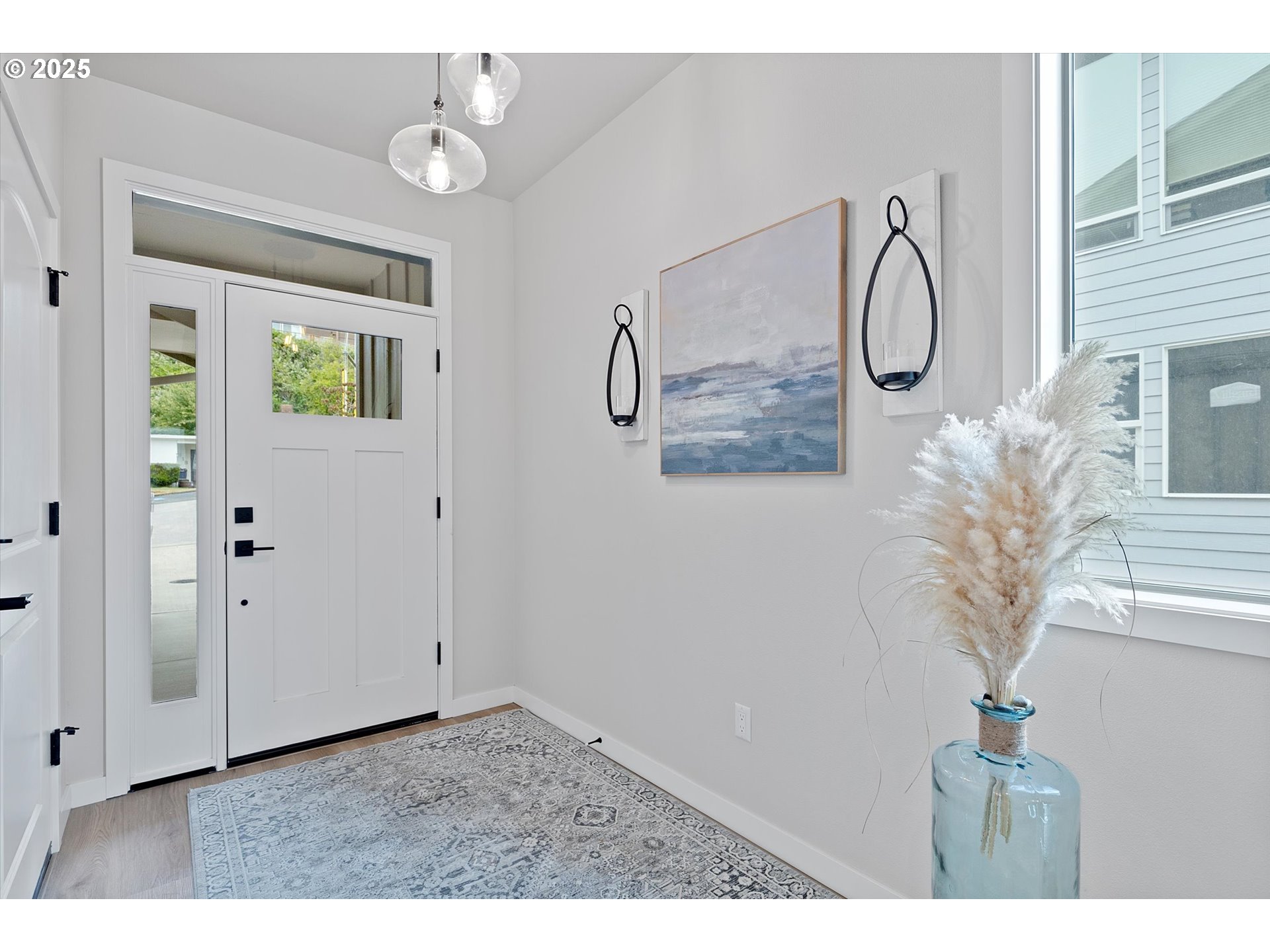 811 Southwest 13th Street Newport, OR 97365 - Photo 4 of 45 a view of a livingroom with furniture and chandelier fan
