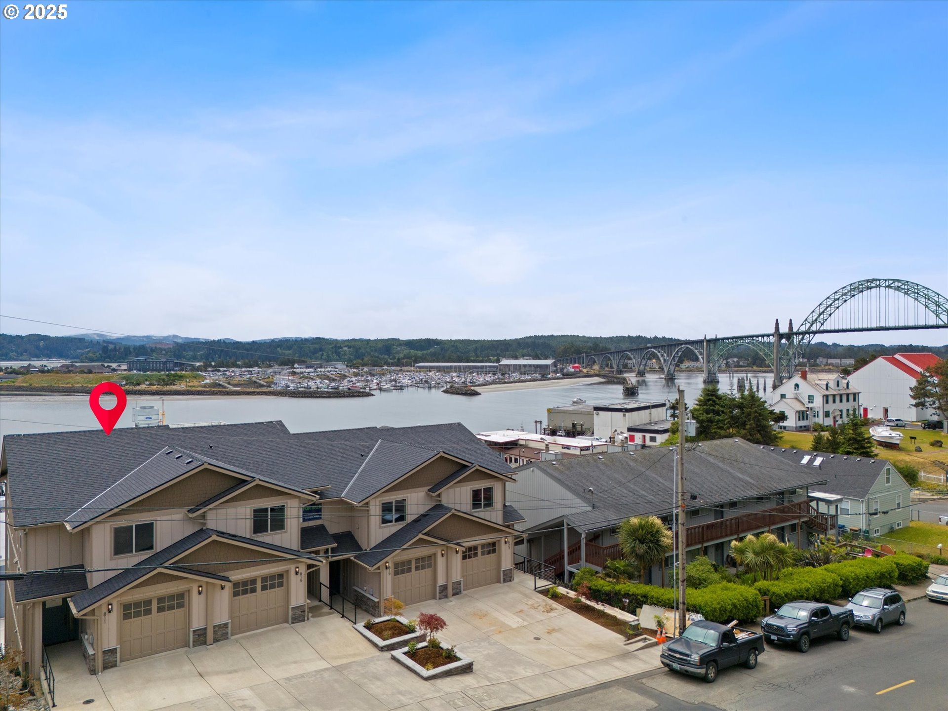 811 Southwest 13th Street Newport, OR 97365 - Photo 45 of 45 an aerial view of a yard with table and chairs