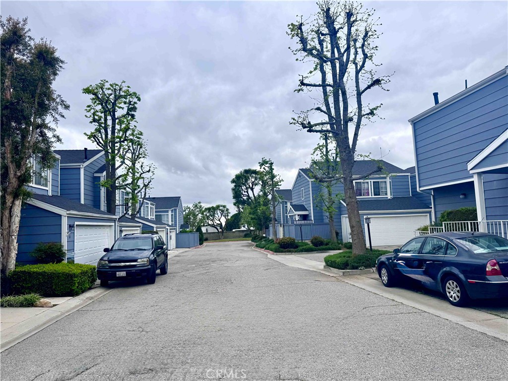 14152 Foothill Boulevard, Unit 35 Sylmar, CA 91342 - Photo 3 of 30 a car parked in front of a house