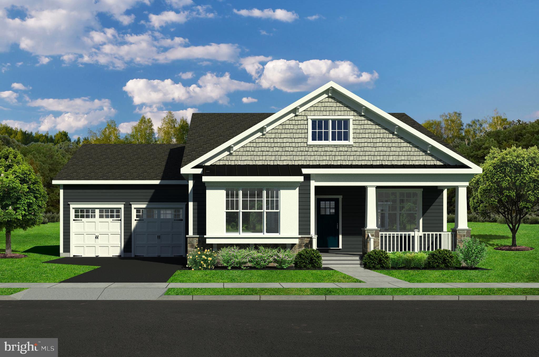 530 Longhorn Loop Middletown, DE 19709 - Photo 2 of 11 a front view of a house with a garden and yard