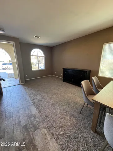 a view of a livingroom with furniture and window