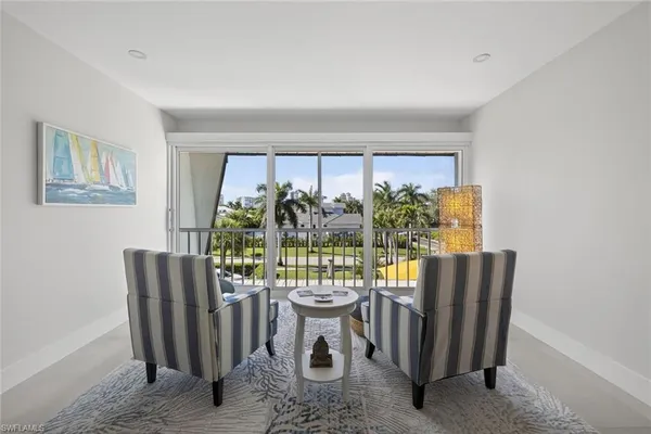 a view of a dining room with furniture window and outdoor kitchen