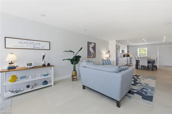 a living room with furniture and a table