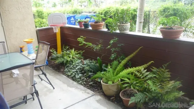a view of a porch with furniture