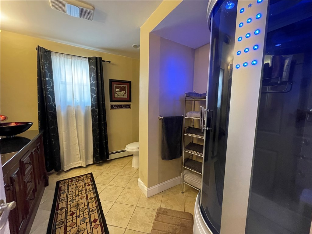 56 Olo Street Woonsocket, RI 02895 - Photo 21 of 46 lowel level of townhouse style unit