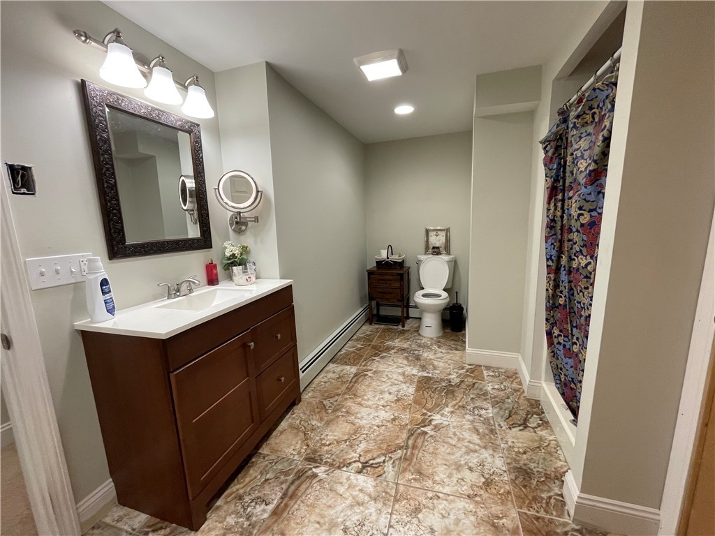 56 Olo Street Woonsocket, RI 02895 - Photo 25 of 46 townhouse style unit lower level bath
