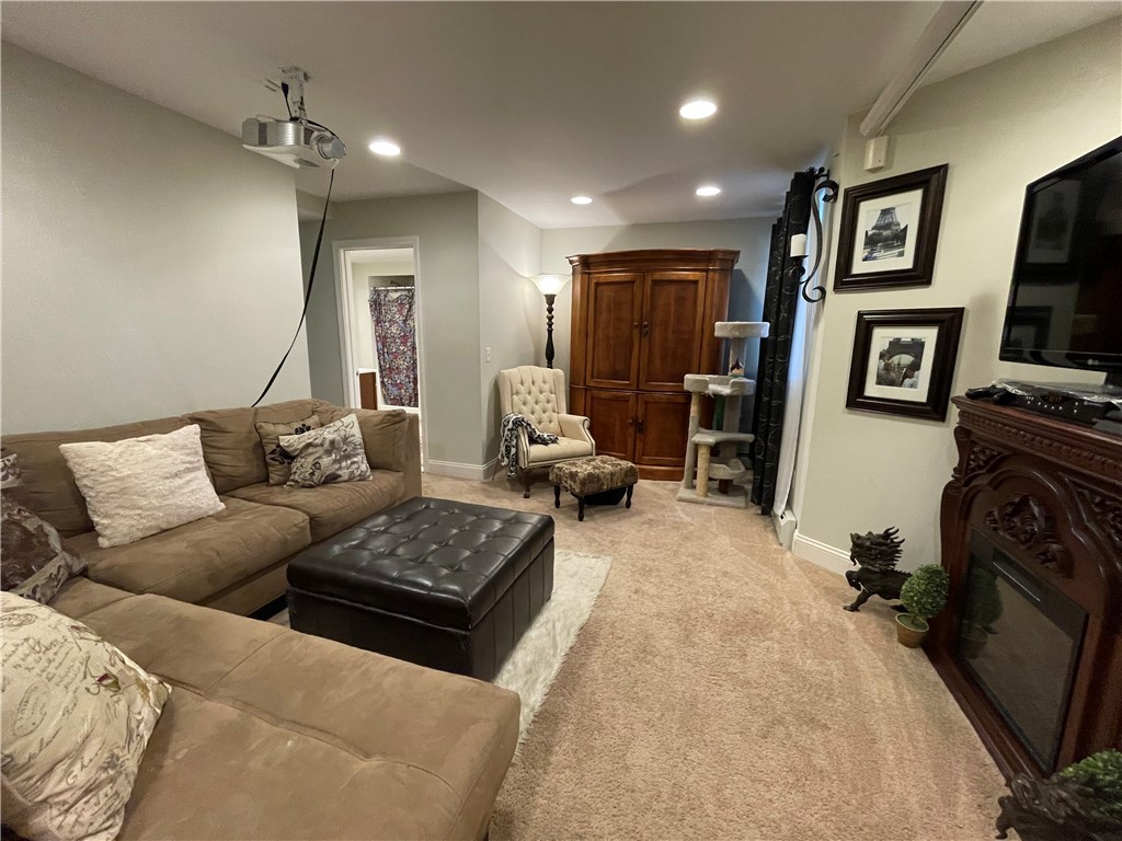 56 Olo Street Woonsocket, RI 02895 - Photo 26 of 46 townhouse style unit- lower level family room