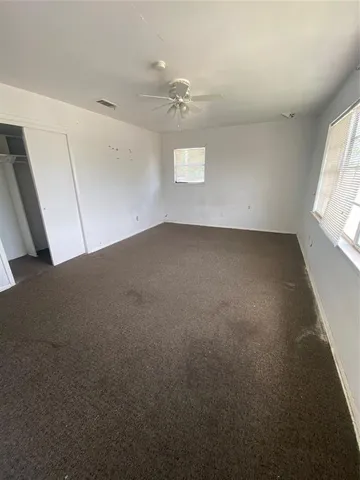 a view of a room with a window