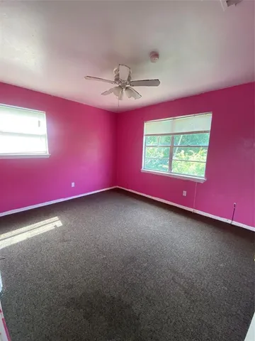 a view of a room with a window