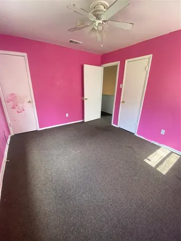 a view of a room with windows