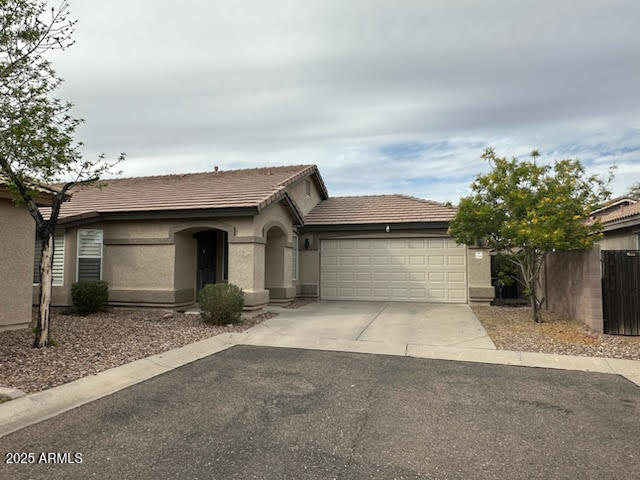 1736 North Seton Mesa, AZ 85205 - Photo 1 of 26 front view of a house with a garage