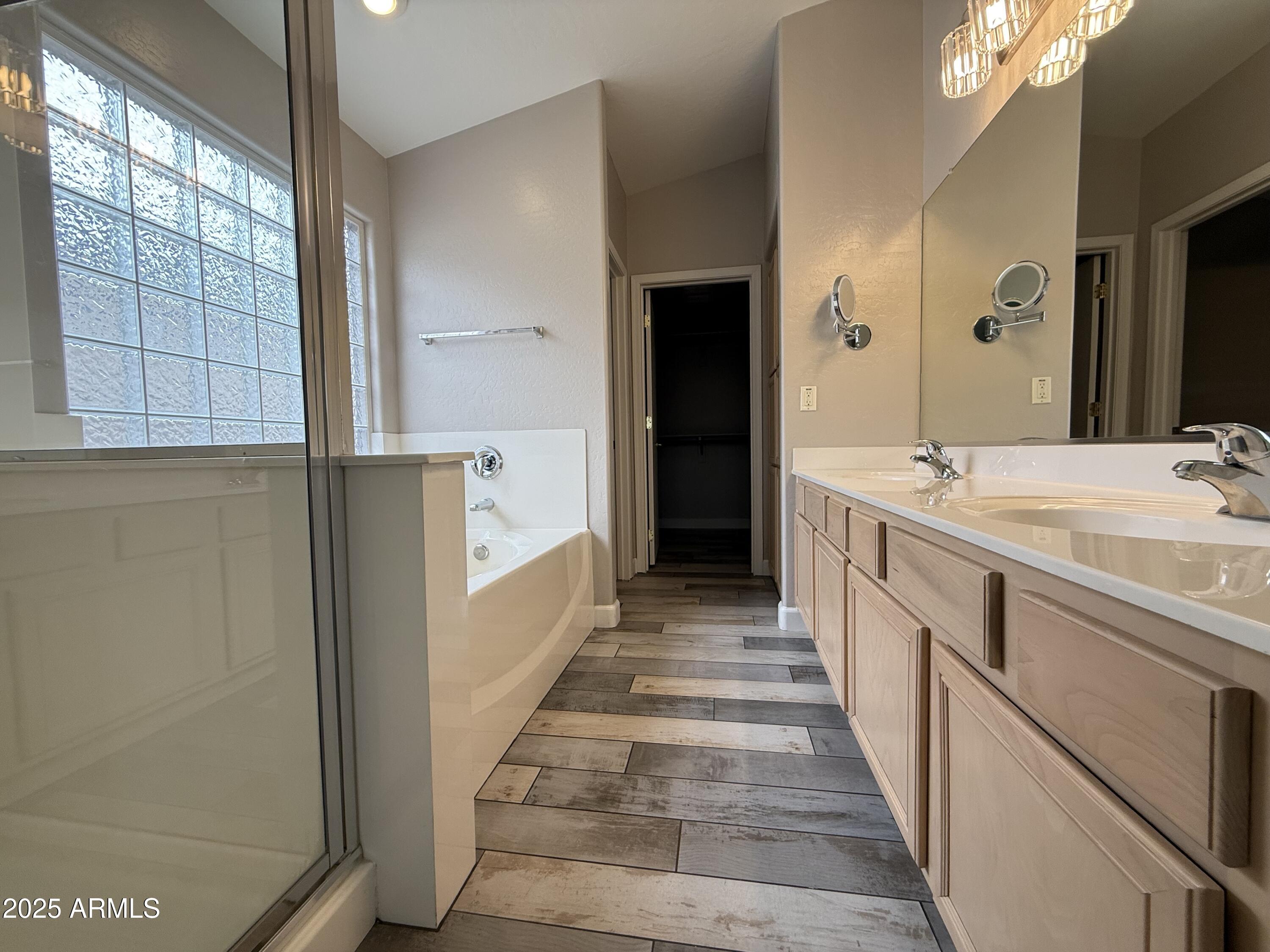 1736 North Seton Mesa, AZ 85205 - Photo 17 of 26 a view of a bathroom with sink and mirror