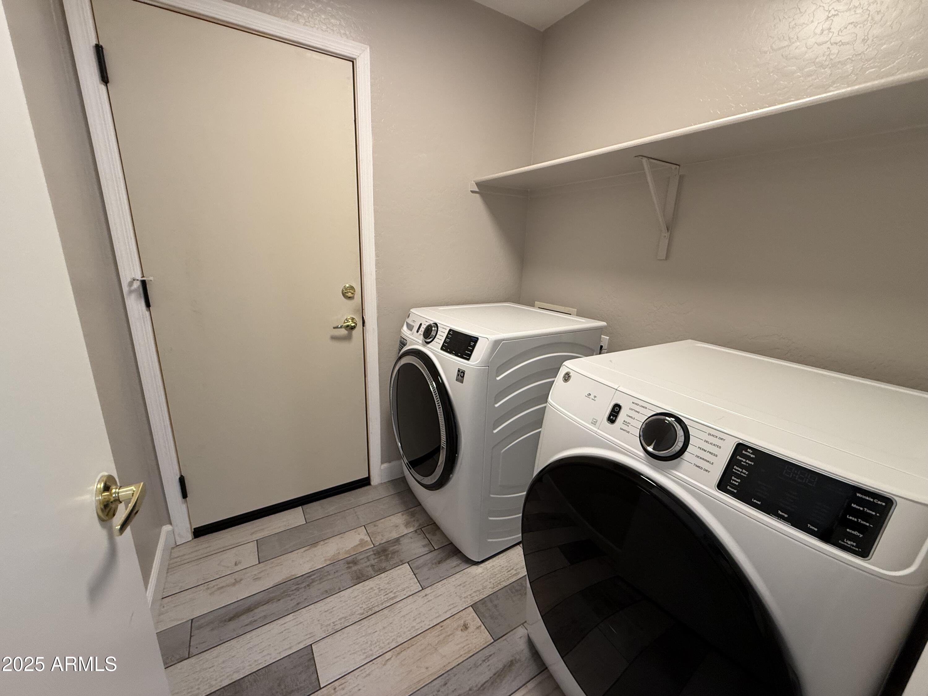 1736 North Seton Mesa, AZ 85205 - Photo 22 of 26 a utility room with dryer and washer