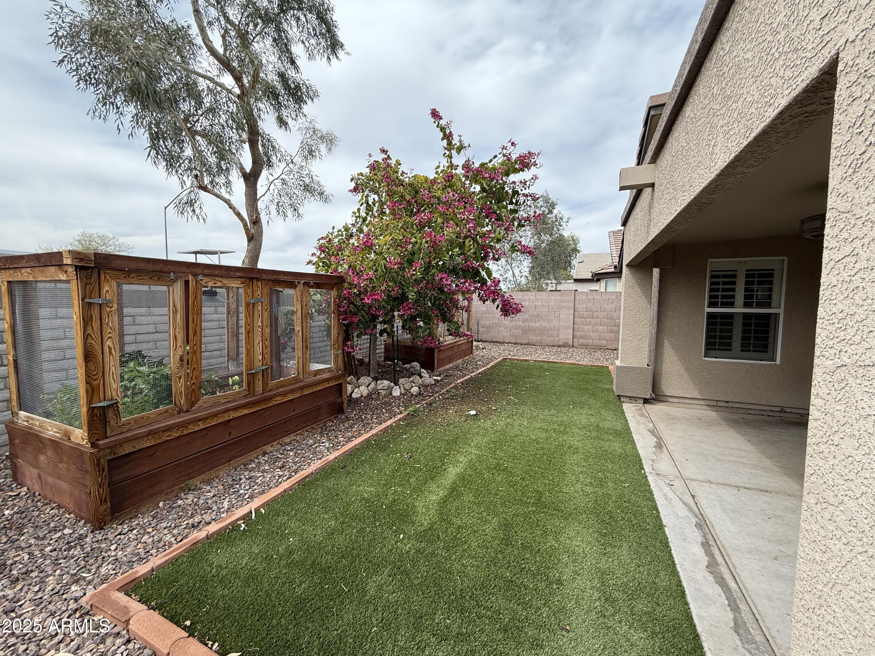 1736 North Seton Mesa, AZ 85205 - Photo 23 of 26 a view of a house with backyard and sitting area
