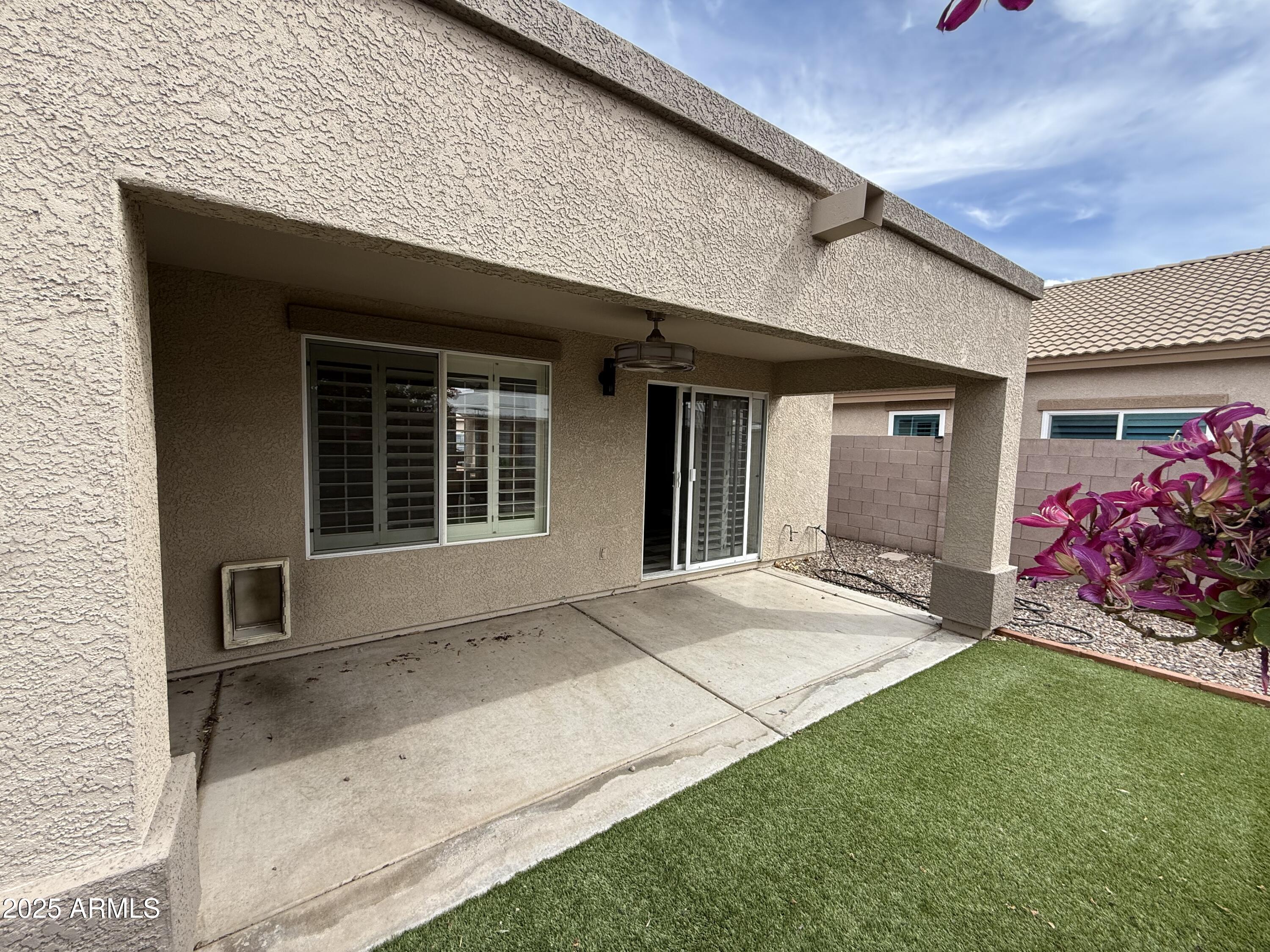 1736 North Seton Mesa, AZ 85205 - Photo 26 of 26 a front view of a house with a garden