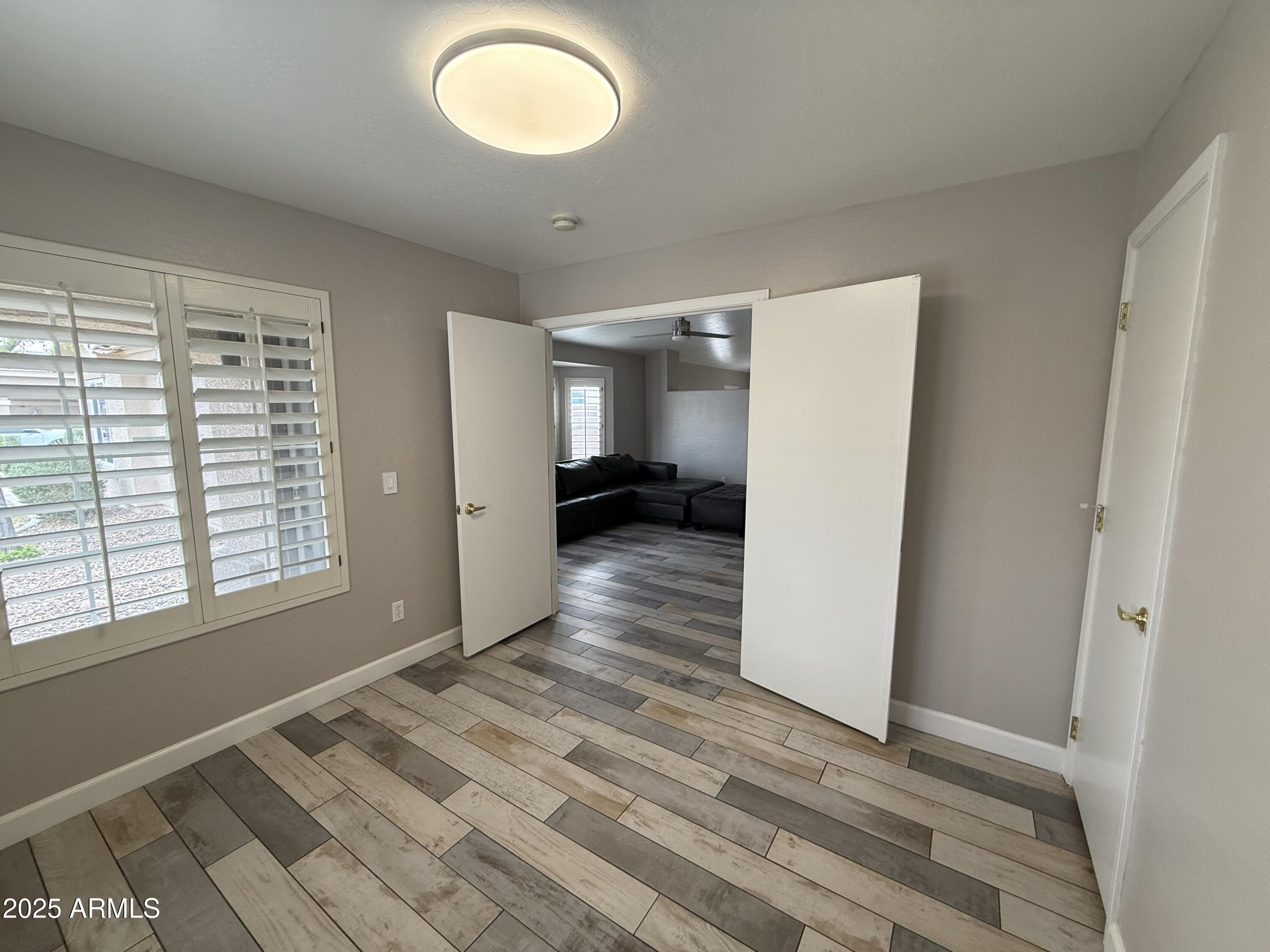 1736 North Seton Mesa, AZ 85205 - Photo 7 of 26 a view of livingroom with window and hardwood floor