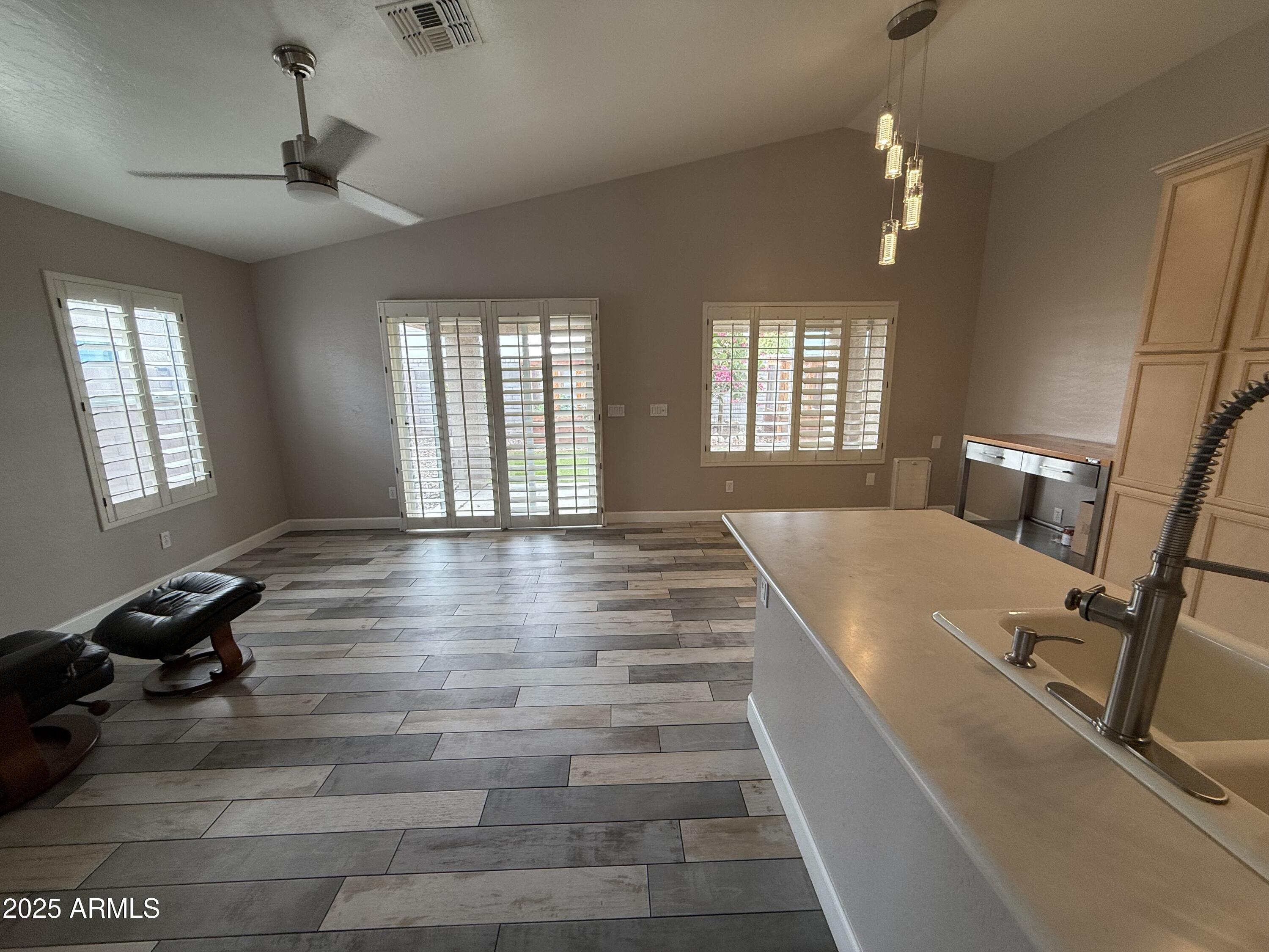 1736 North Seton Mesa, AZ 85205 - Photo 8 of 26 a view of entryway and bedroom with wooden floor