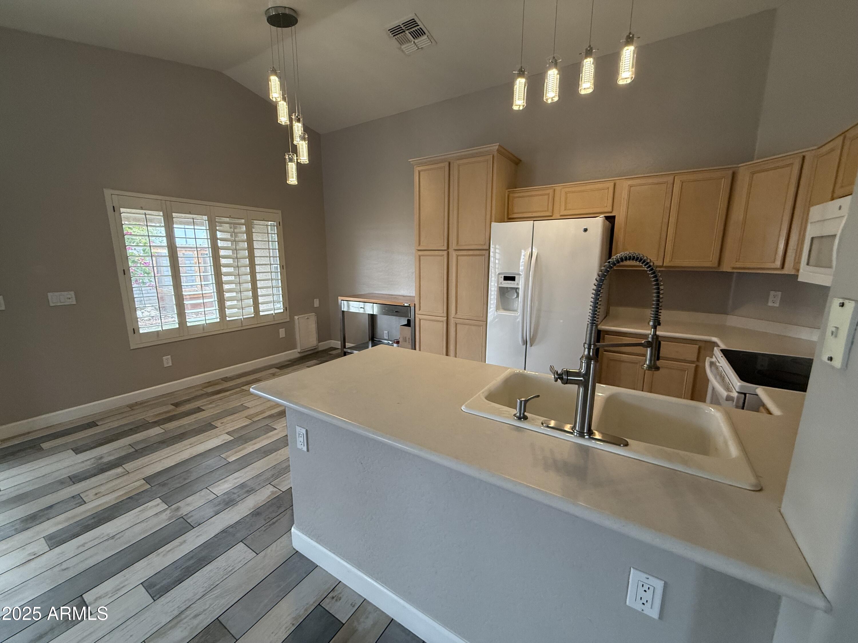 1736 North Seton Mesa, AZ 85205 - Photo 9 of 26 a bathroom with a sink a toilet and mirror