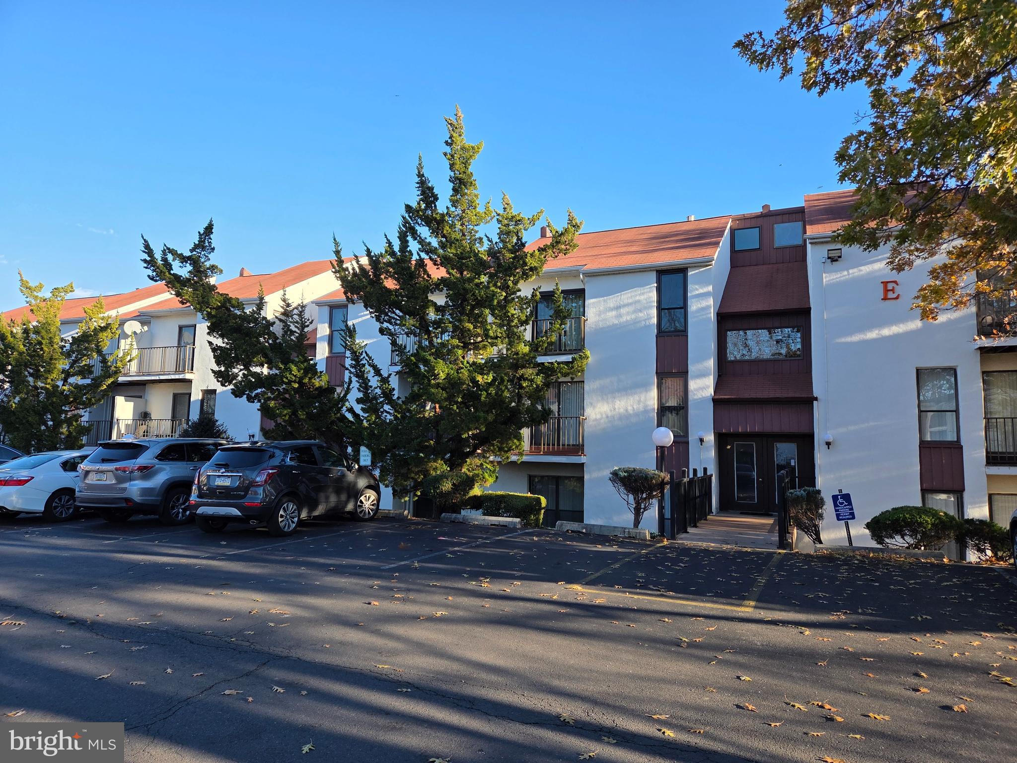 a front view of a building with street view