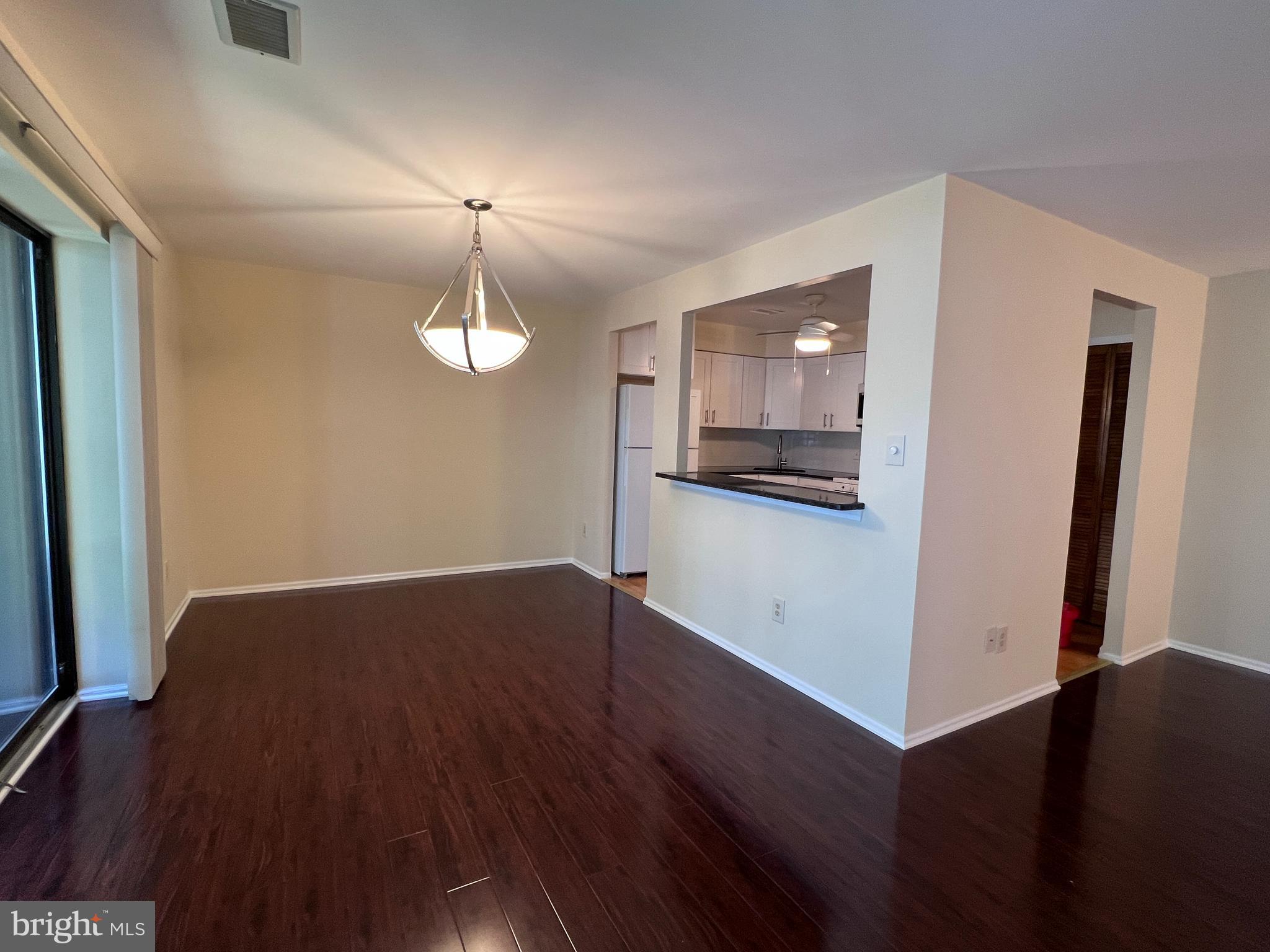 301 Byberry Road, Unit E8 Philadelphia, PA 19116 - Photo 15 of 44 a view of a room with wooden floor and staircase