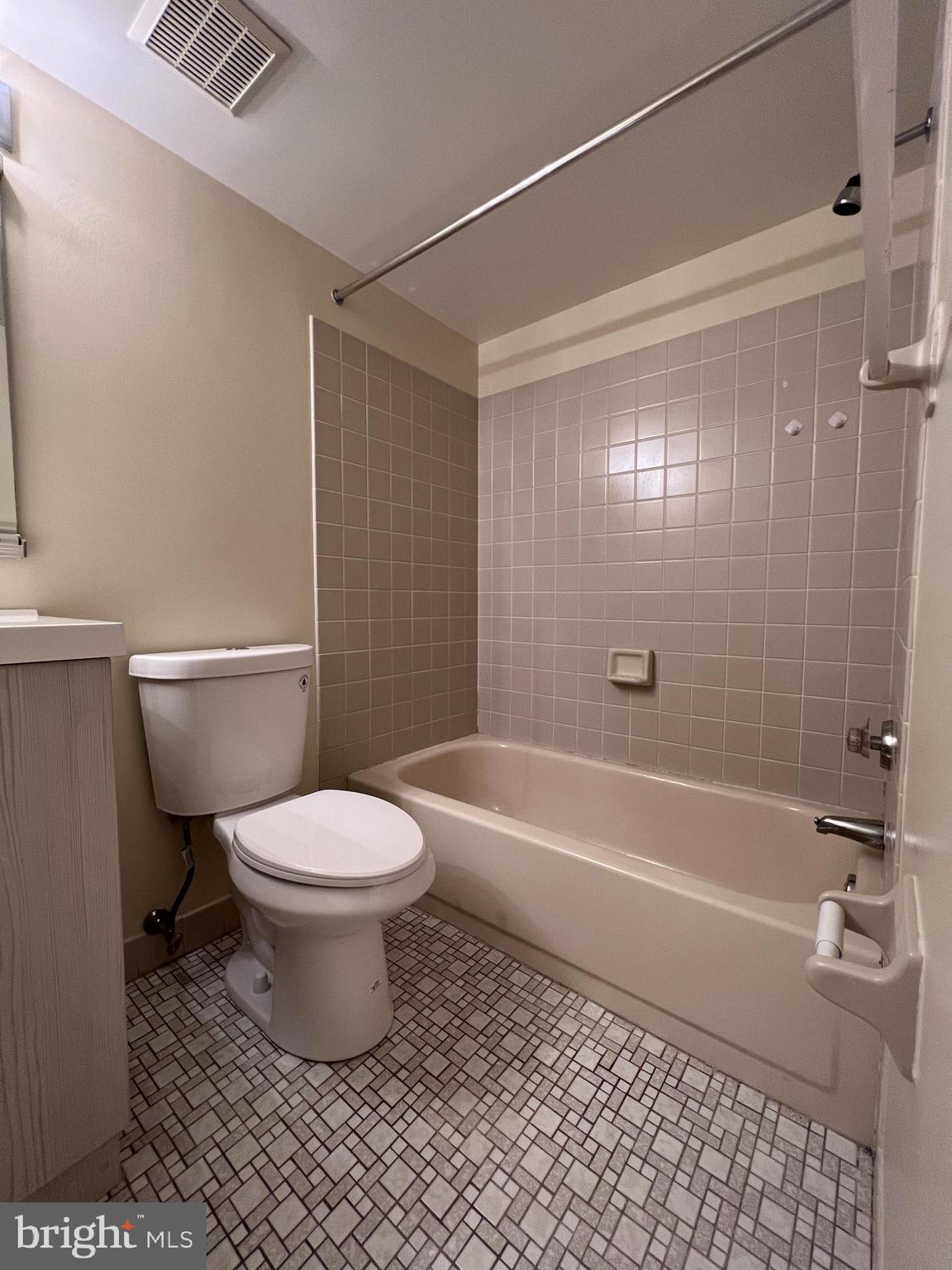 301 Byberry Road, Unit E8 Philadelphia, PA 19116 - Photo 20 of 44 a bathroom with a toilet a sink and a shower