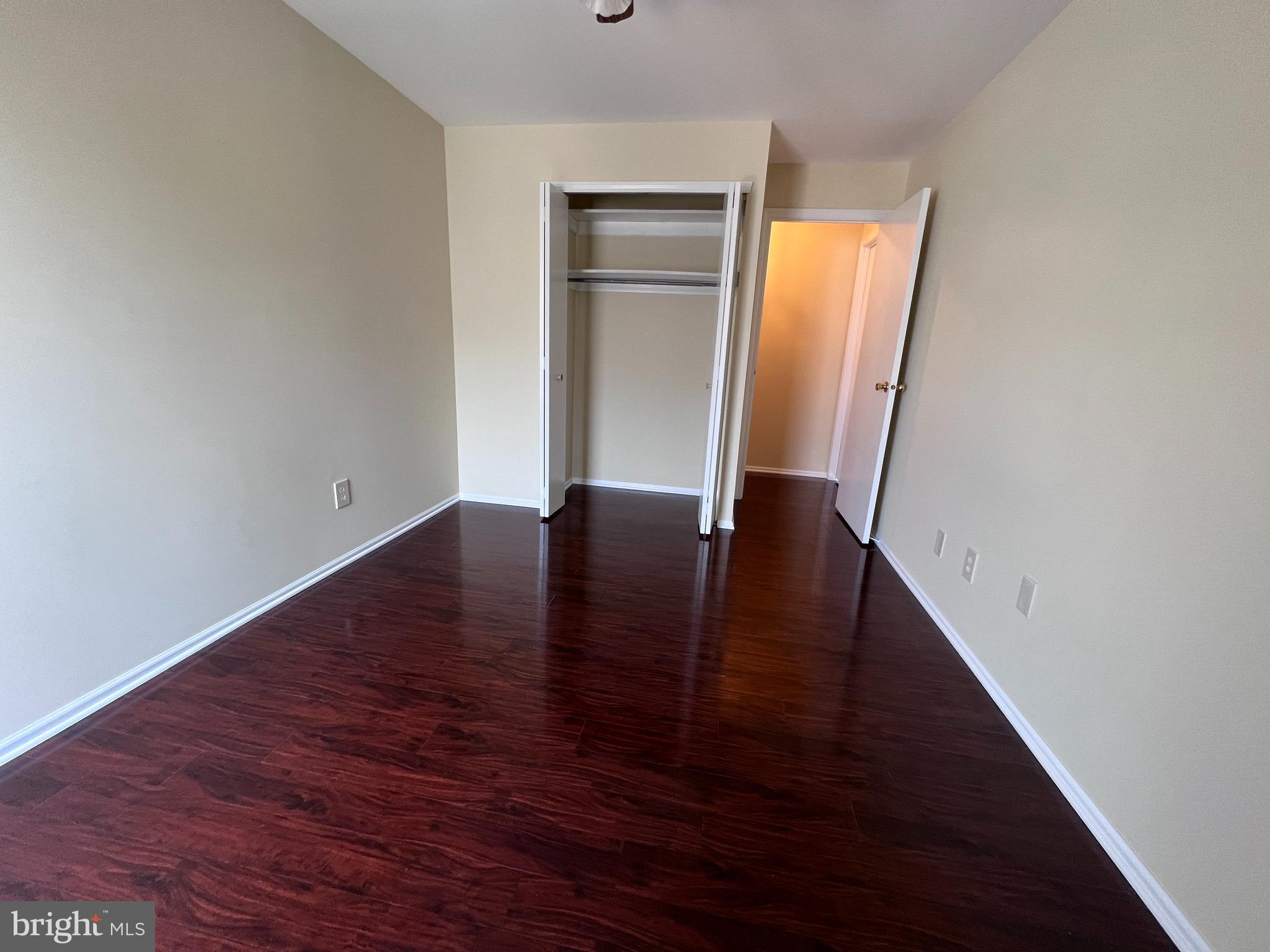 301 Byberry Road, Unit E8 Philadelphia, PA 19116 - Photo 23 of 44 an entryway in a hallway with wooden floor