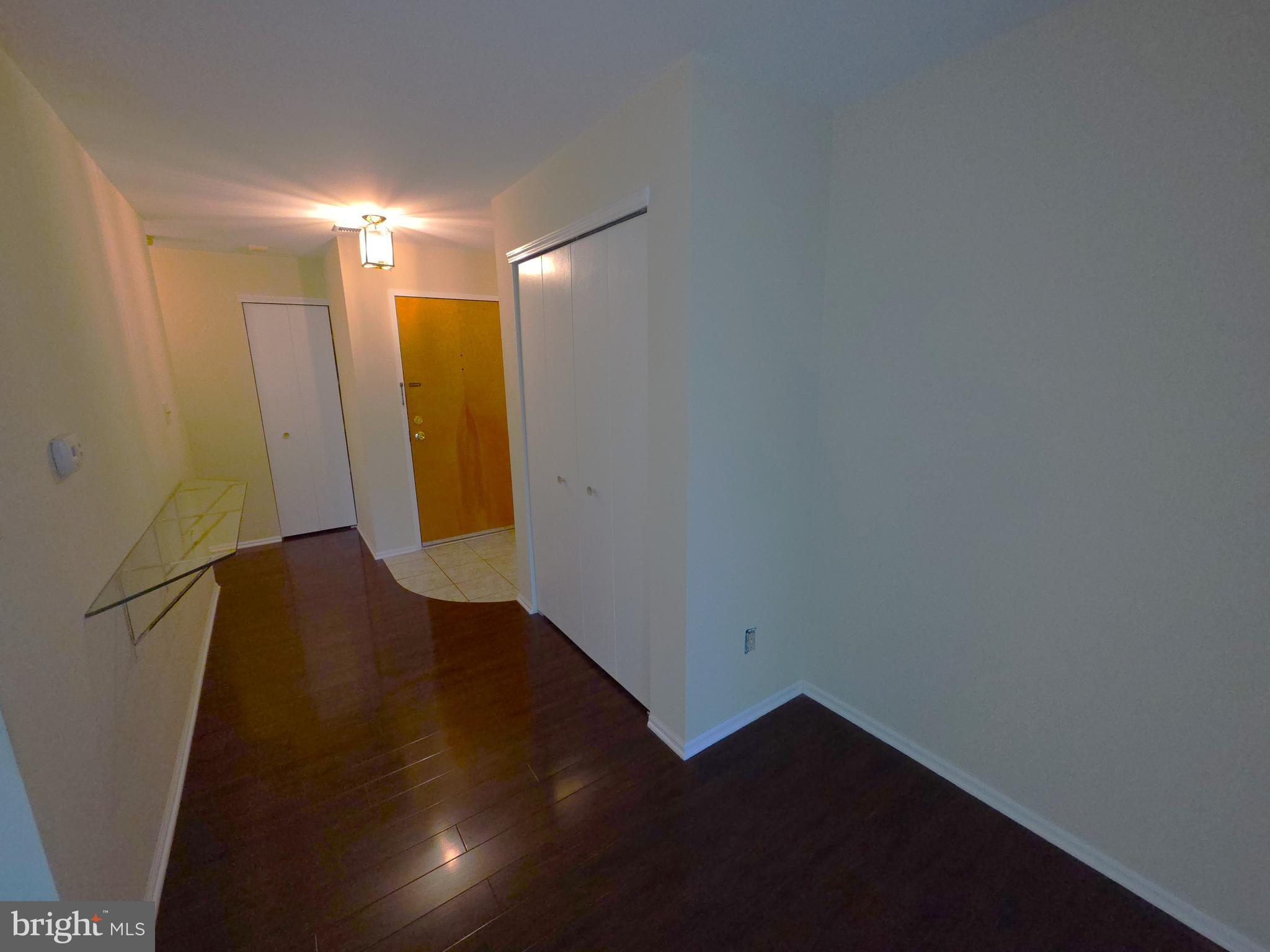 301 Byberry Road, Unit E8 Philadelphia, PA 19116 - Photo 36 of 44 a view of hallway with wooden floor