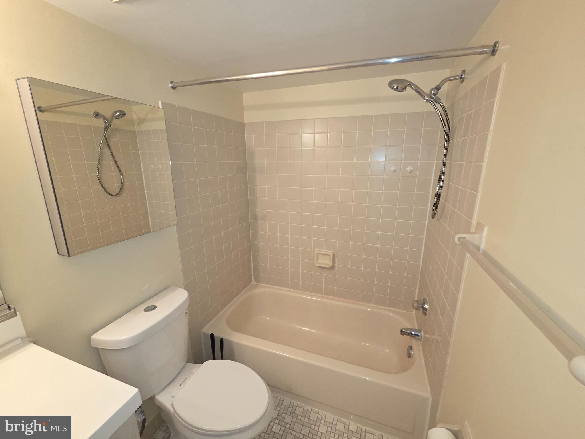 301 Byberry Road, Unit E8 Philadelphia, PA 19116 - Photo 41 of 44 a bathroom with a shower a toilet and a shower