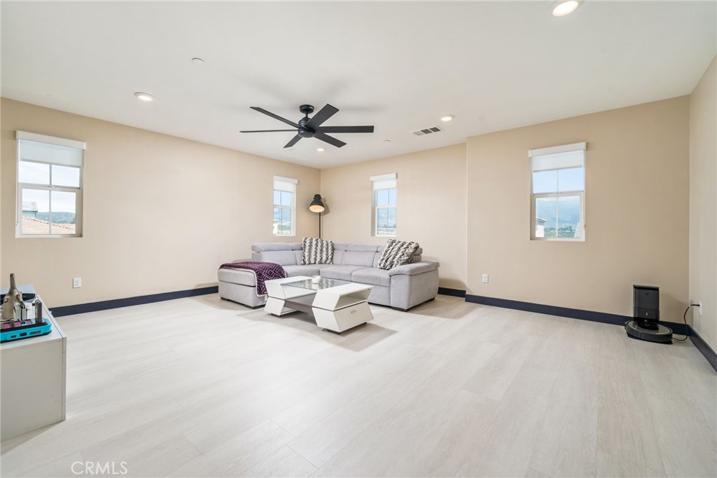 2414 Crater Avenue Rialto, CA 92377 - Photo 19 of 50 a living room with furniture and a window
