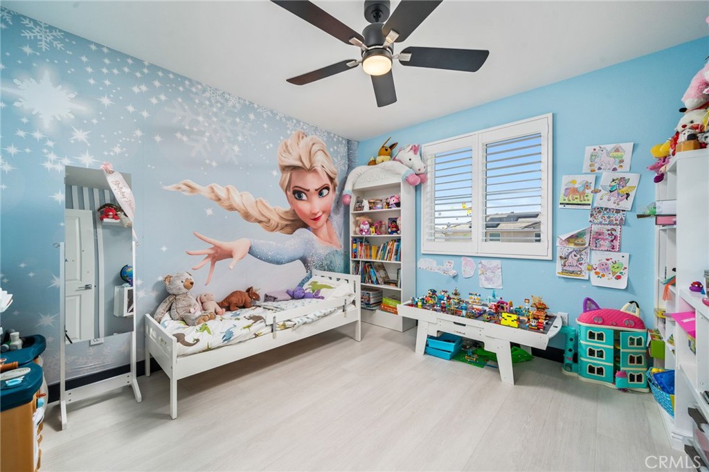 2414 Crater Avenue Rialto, CA 92377 - Photo 23 of 50 a bedroom with furniture and a bed