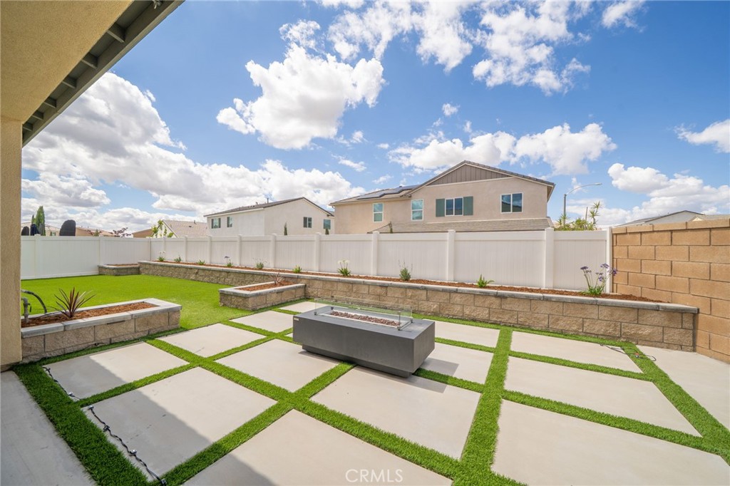 2414 Crater Avenue Rialto, CA 92377 - Photo 34 of 50 a view of a swimming pool with a lounge chairs